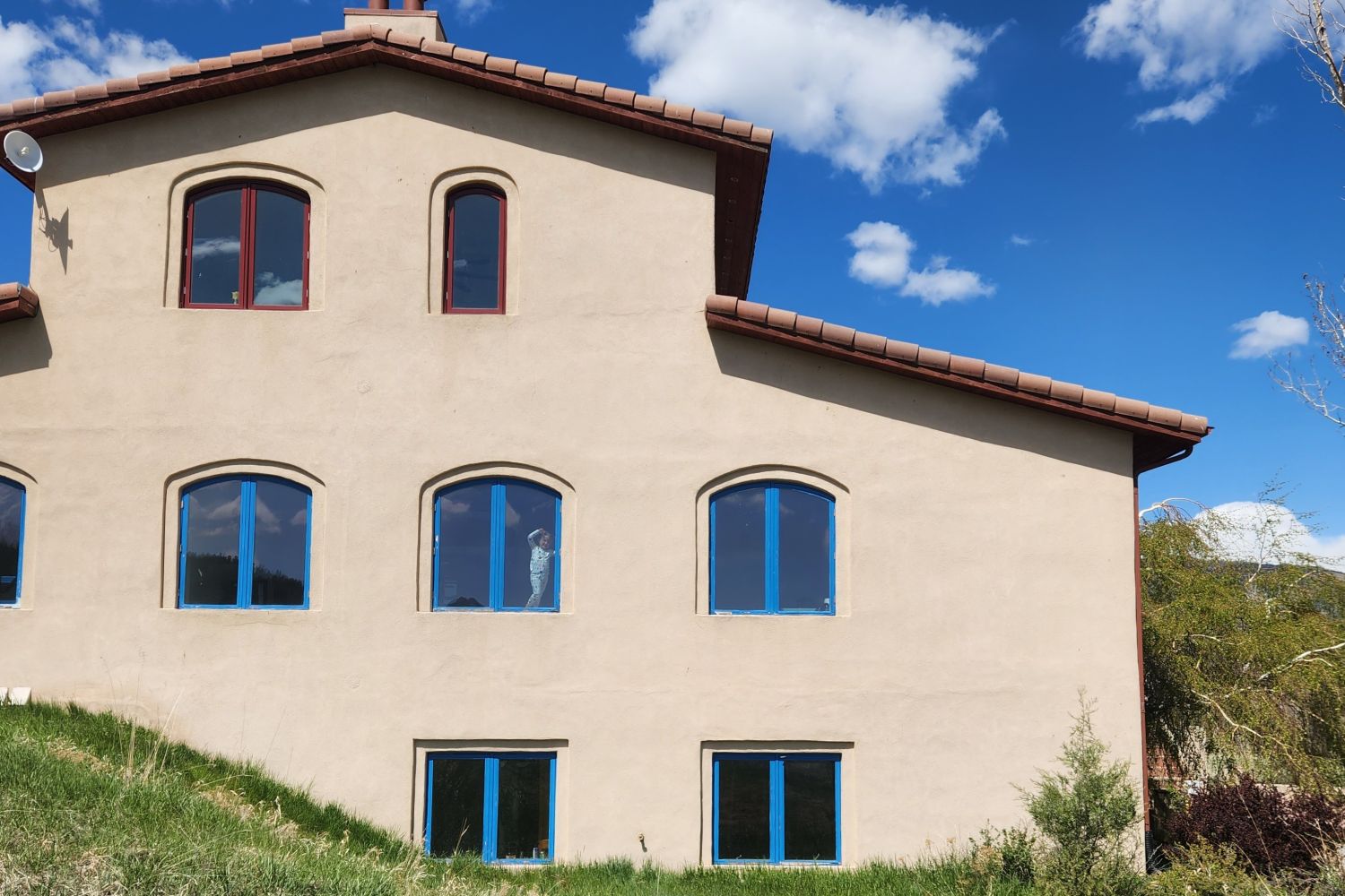 Back side, set into the hillside.